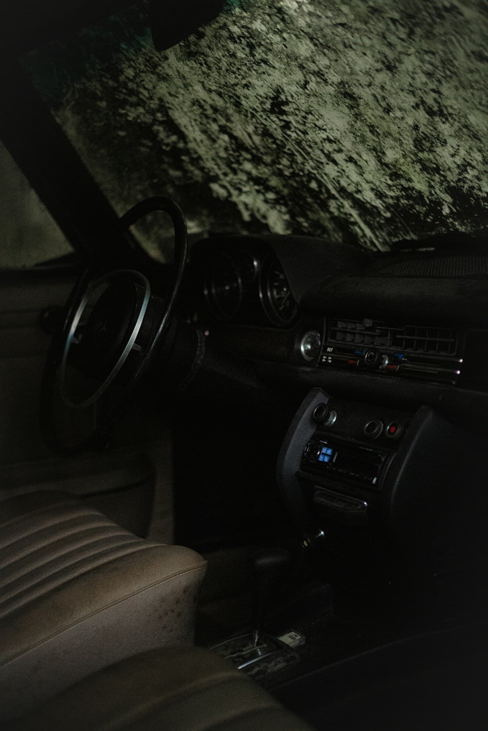Dirty and worn real car interior before detailing